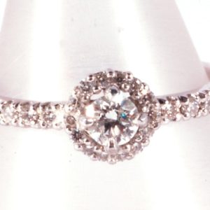 White gold Diamond set Halo ring with diamond set shoulders