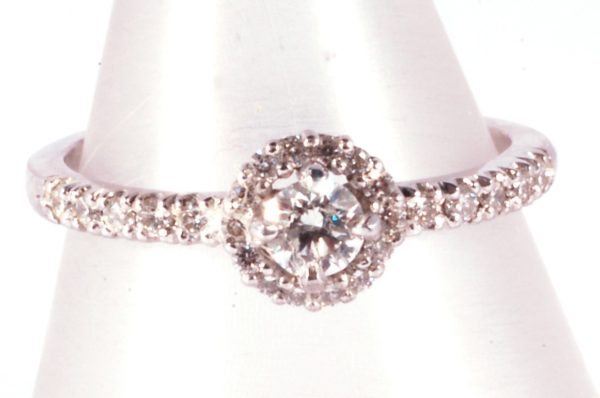 White gold Diamond set Halo ring with diamond set shoulders